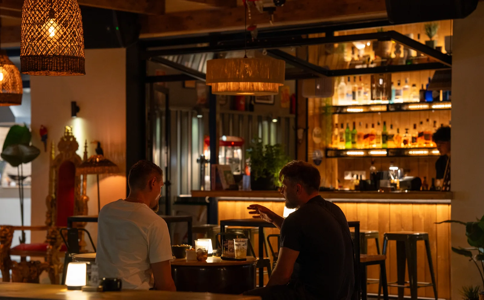 The team preparing drinks behind The Cup’s bar